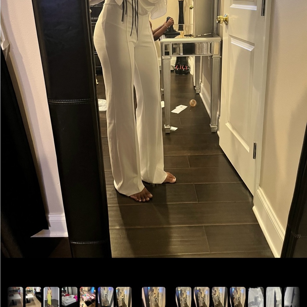 Fashion Nova White Wide Leg pants. Great fit! Gives you a good look.